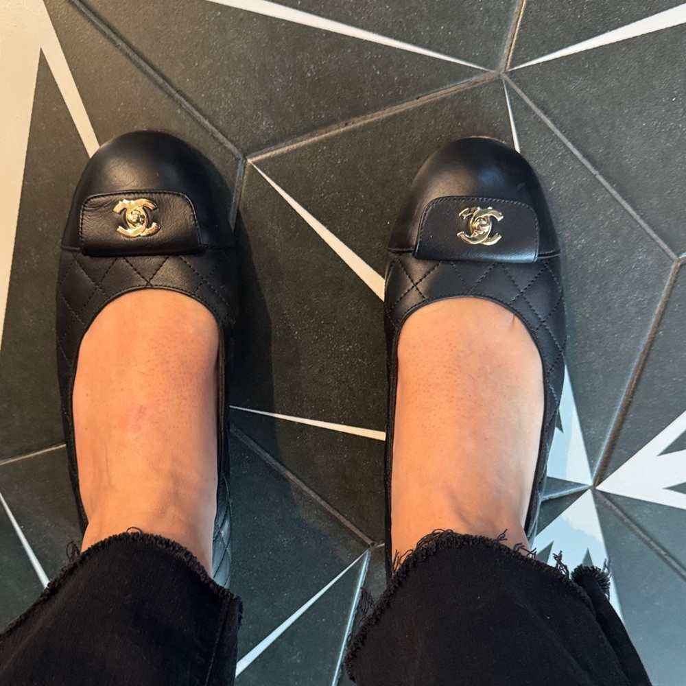Chanel Black Quilted Flats with Gold Logo
